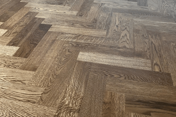 Herringbone hardwood installation and refinishing by LUKS Construction Kirkland