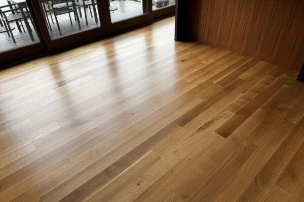 white oak hardwood refinishing in Mercer Island lakefront home by LUKS Construction