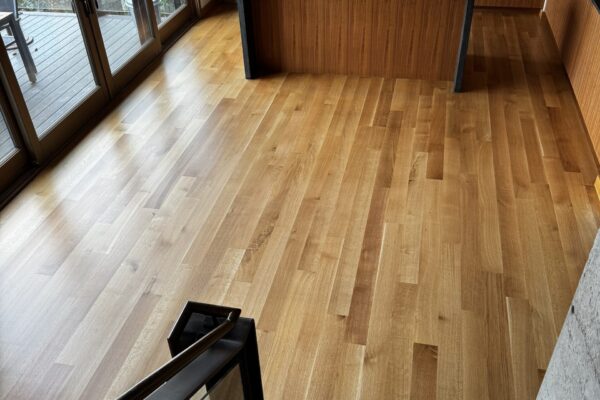 white oak hardwood refinishing in Mercer Island lakefront home by LUKS Construction