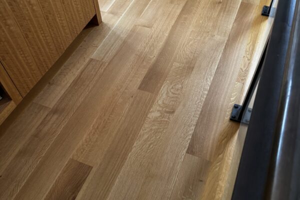 white oak hardwood refinishing in Mercer Island lakefront home by LUKS Construction