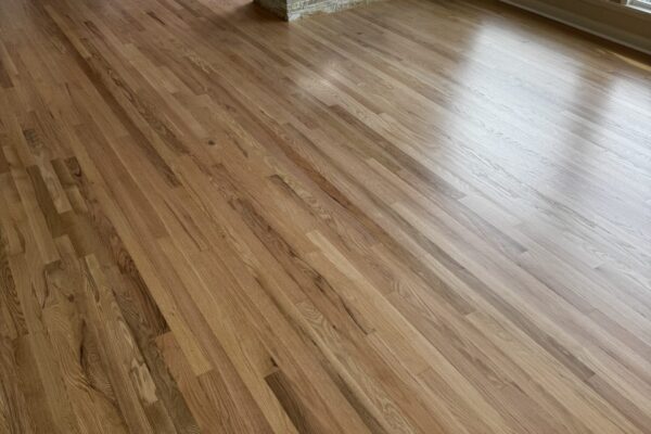 Refinished hardwood flooring in Seattle living room