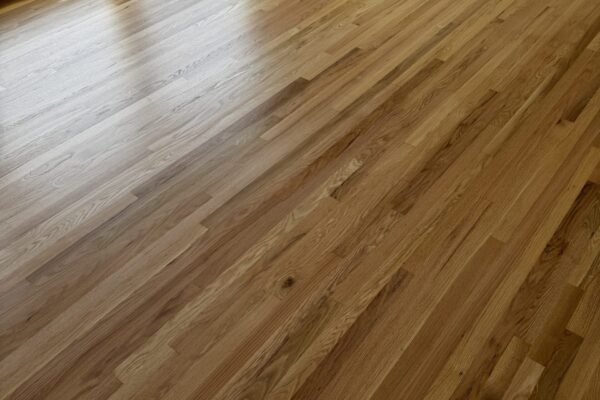 Refinished hardwood flooring in Seattle living room