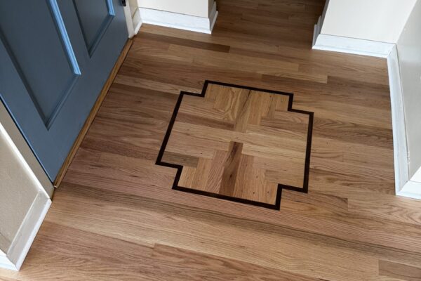 Refinished hardwood flooring in Seattle living room