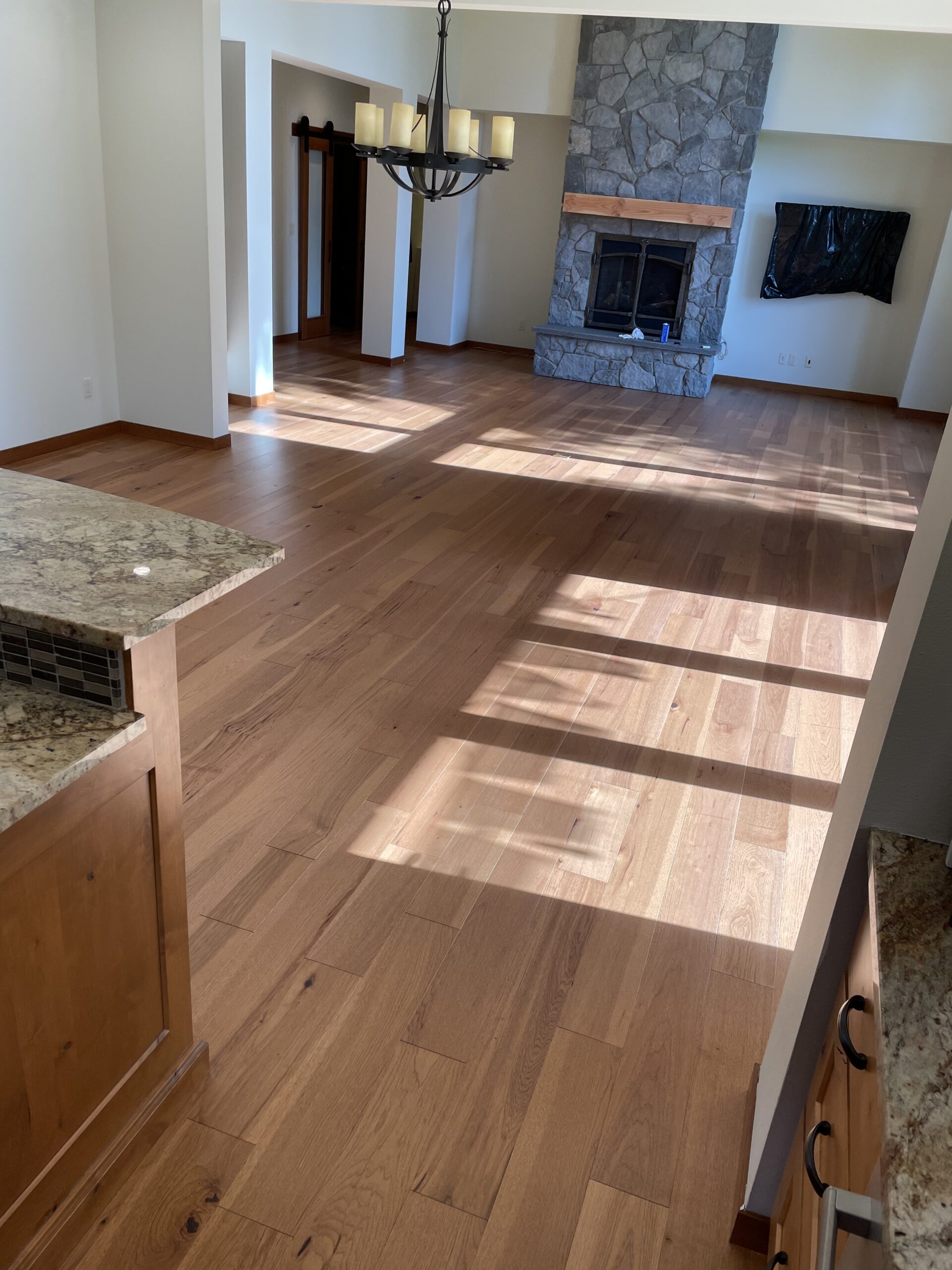 Engineered hardwood floors installation project in Redmond WA by LUKS Construction