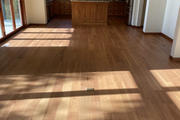 Spacious kitchen with wooden flooring