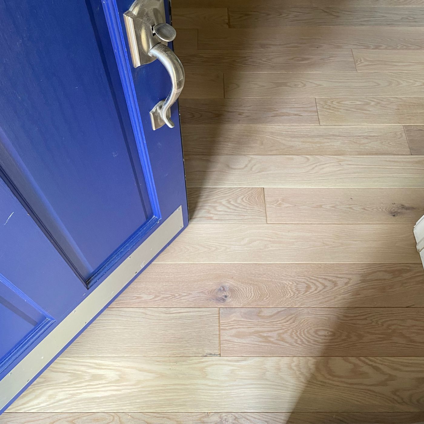 Custom hardwood stairs installation matching new floors in Eastside WA