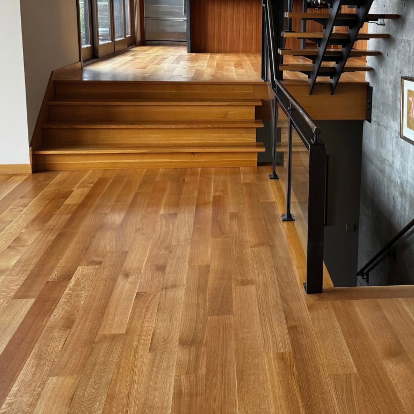 Hardwood floor refinishing result in Kirkland WA with warm matte finish