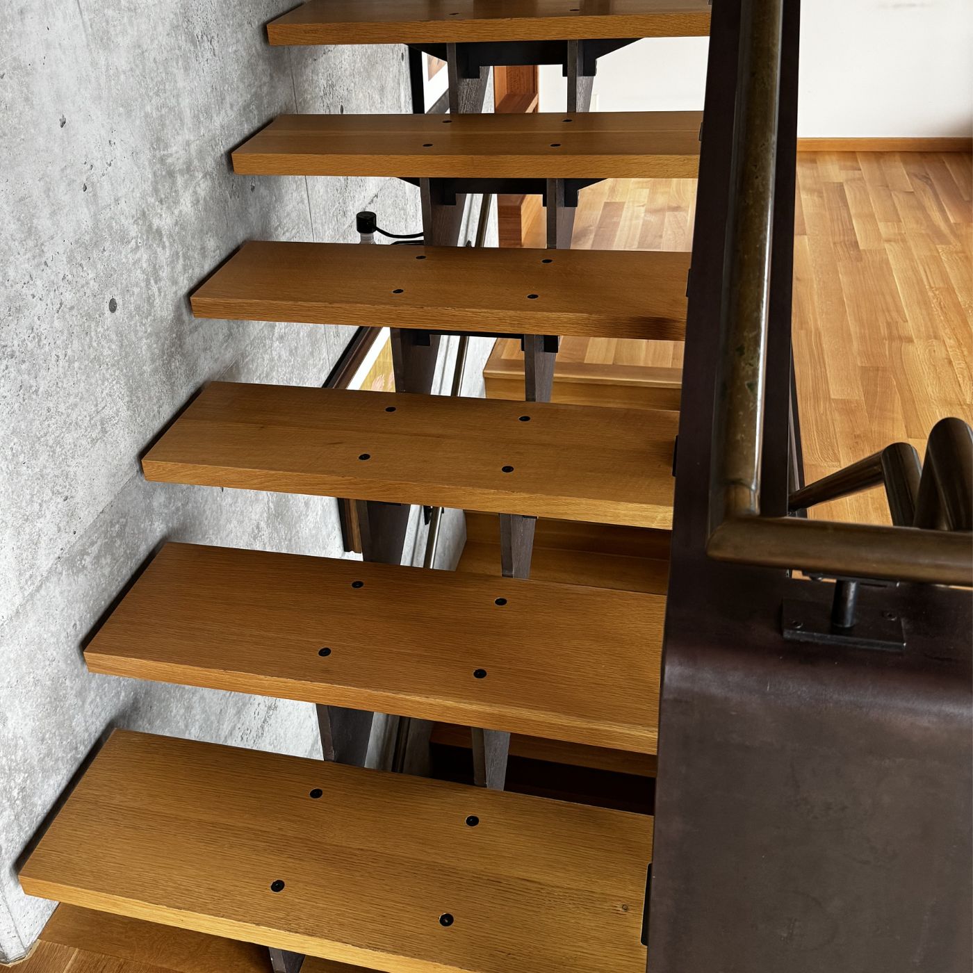 Hardwood stairs installation with clean skirt boards in Kirkland WA